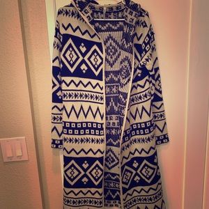 Woman’s long cardigan sweater with hood